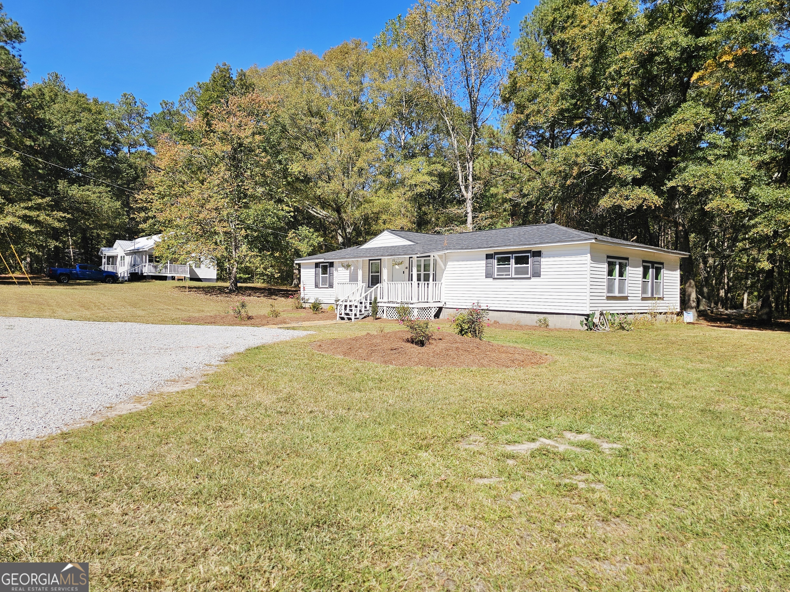 46 Gammon Road Carrollton, GA 30117 - Photo 2 of 17 a house view with a swimming pool