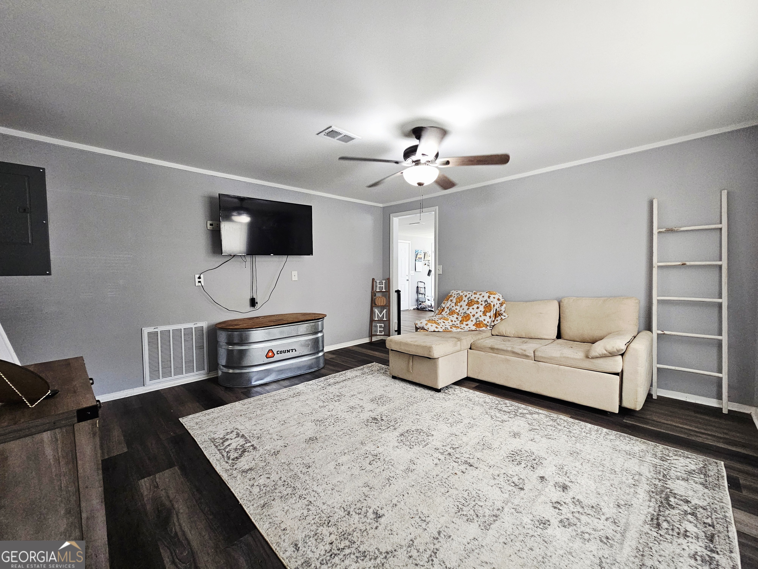 46 Gammon Road Carrollton, GA 30117 - Photo 5 of 17 a living room with furniture and a flat screen tv