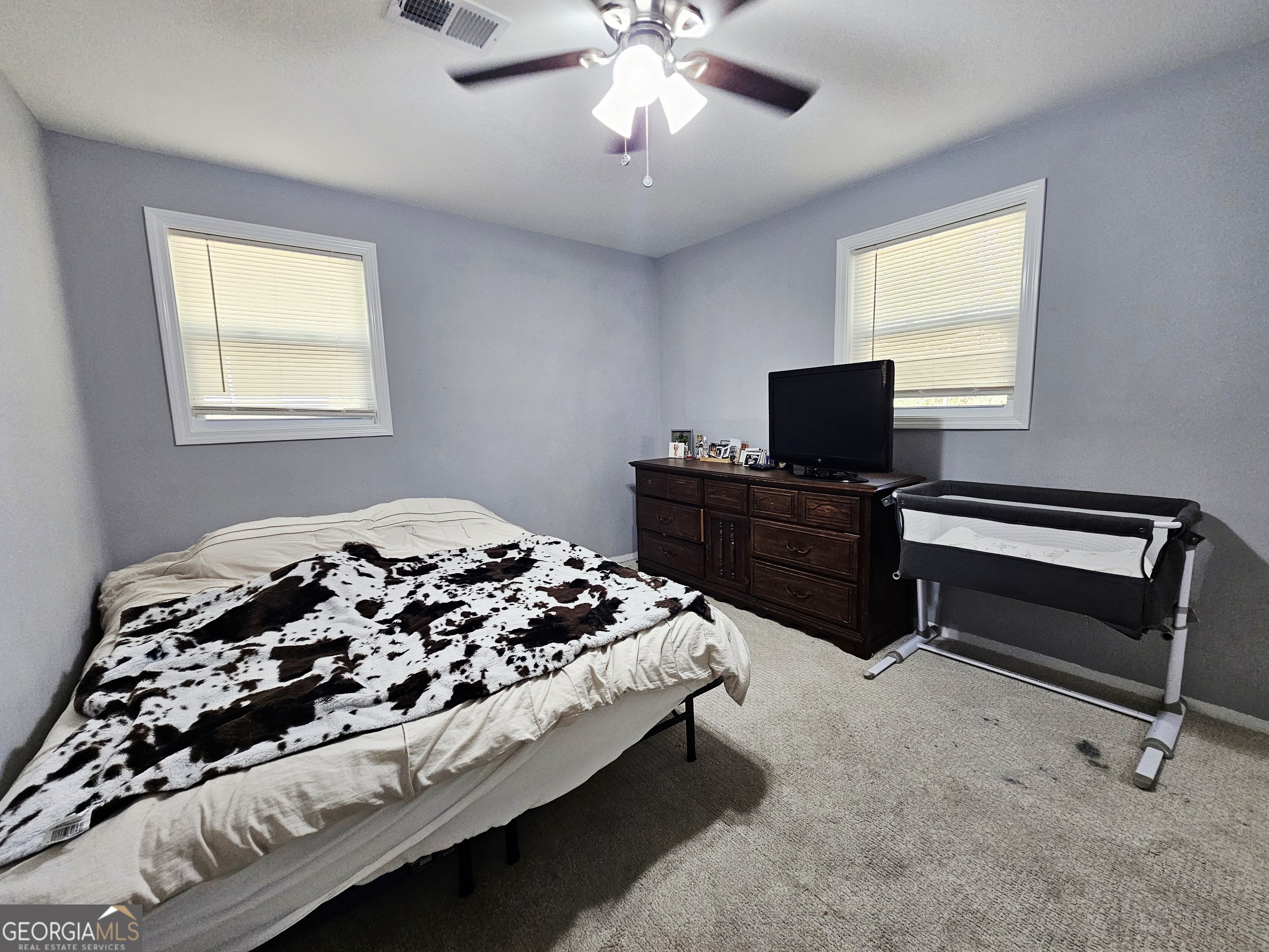 46 Gammon Road Carrollton, GA 30117 - Photo 7 of 17 a bedroom with bed and window