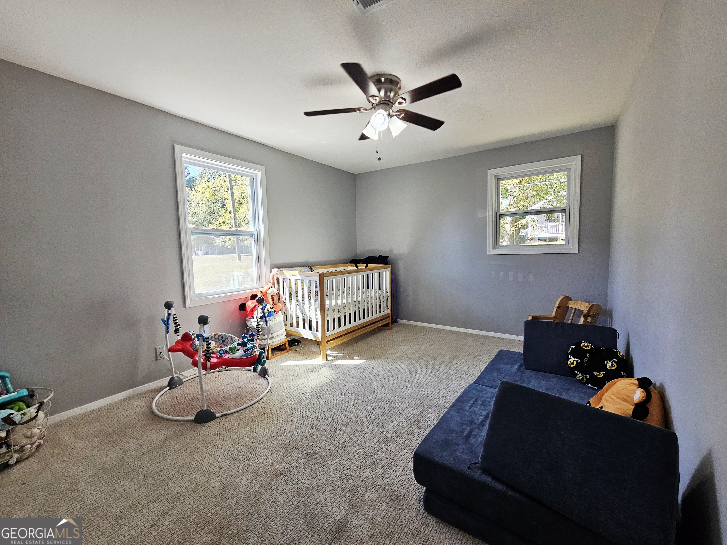 46 Gammon Road Carrollton, GA 30117 - Photo 8 of 17 a living room with furniture and a window