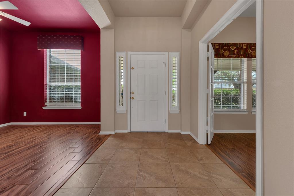 910 Derby Court Celina, TX 75009 - Photo 3 of 27 an empty room with windows