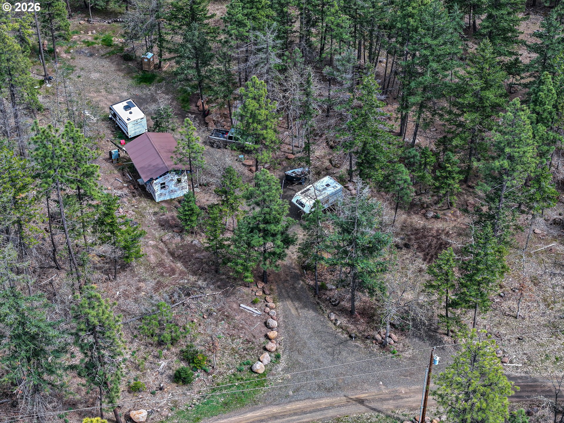 29 Weona Road Goldendale, WA 98620 - Photo 3 of 23 a view of a city with lush green forest
