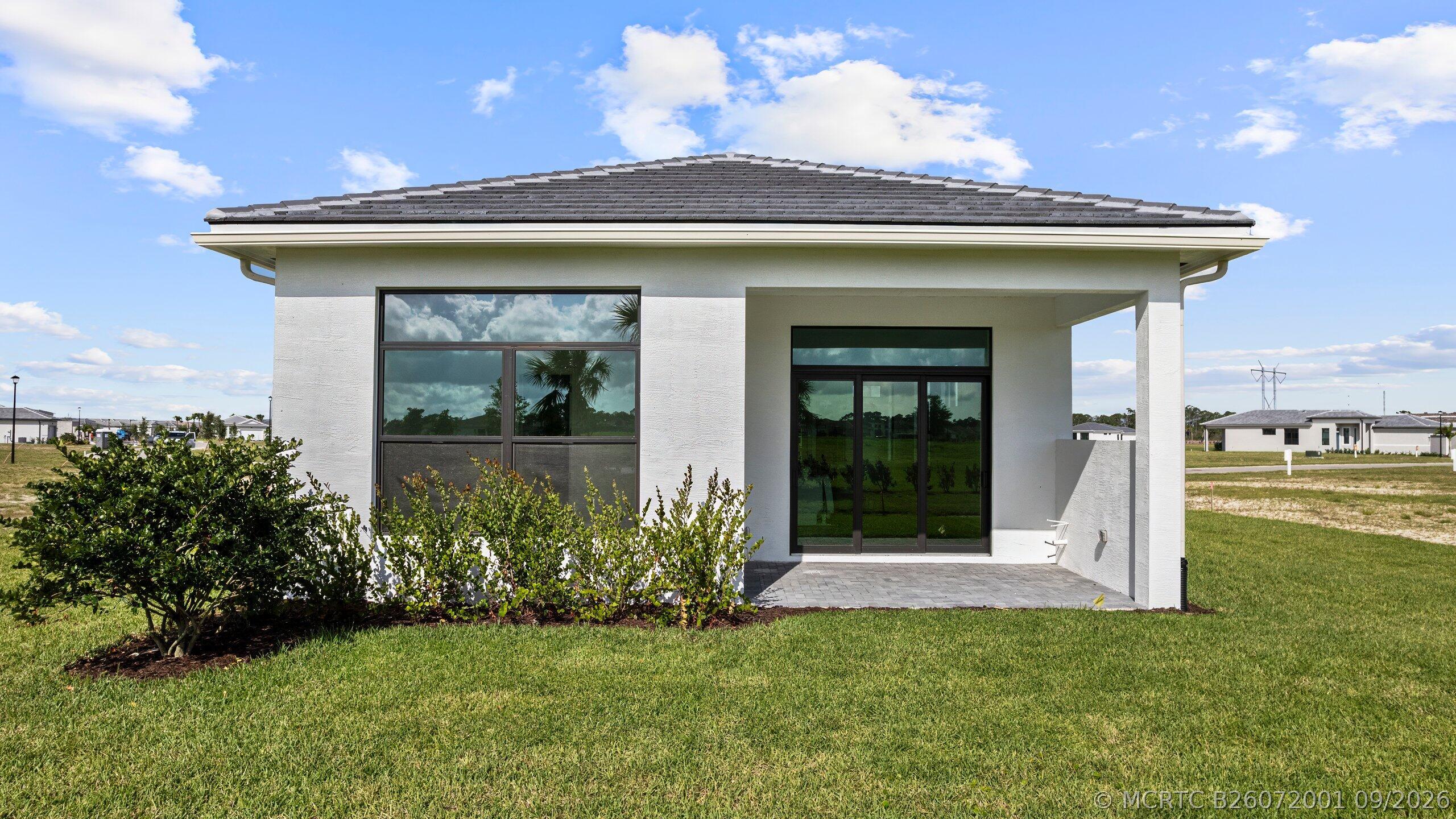7999 Southwest Andrea Way Port St. Lucie, FL 34987 - Photo 33 of 64 Rear Exterior