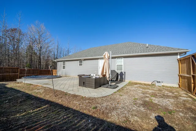 a view of a backyard with a trees