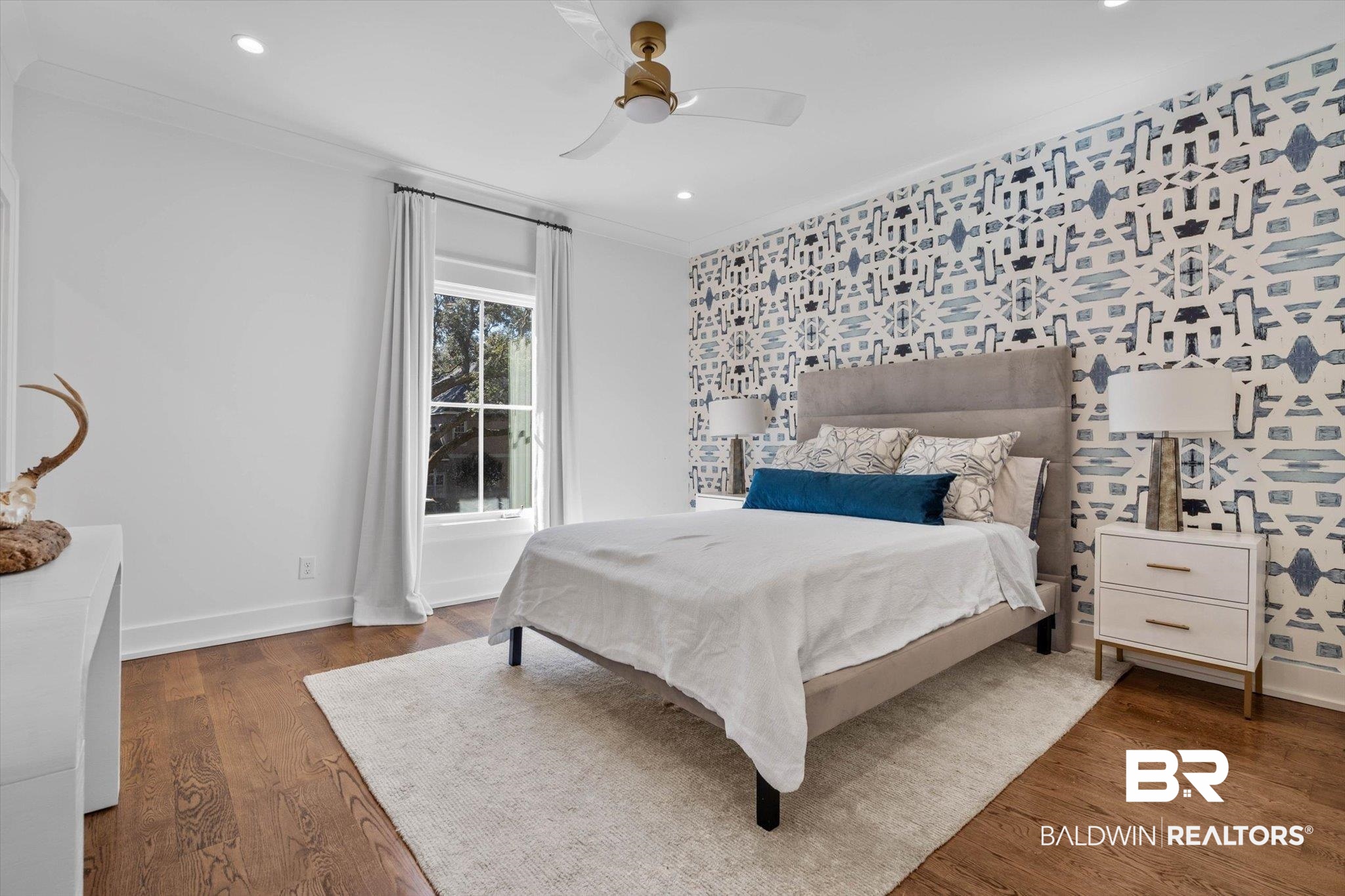 4602 Kingswood Drive Mobile, AL 36608 - Photo 23 of 45 Bedroom featuring ceiling fan, an accent wall, recessed lighting, wood finished floors, and wallpapered walls