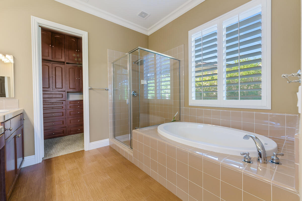 112 Rosetta Court Palm Desert, CA 92211 - Photo 26 of 41 a spacious bathroom with a tub shower and a sink