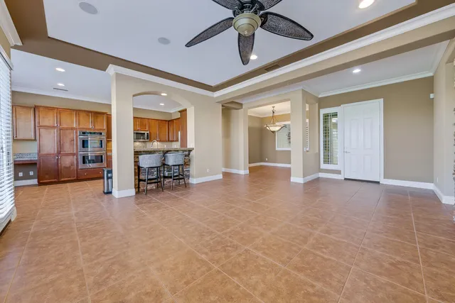 a view of livingroom with hardwood floor and dining room