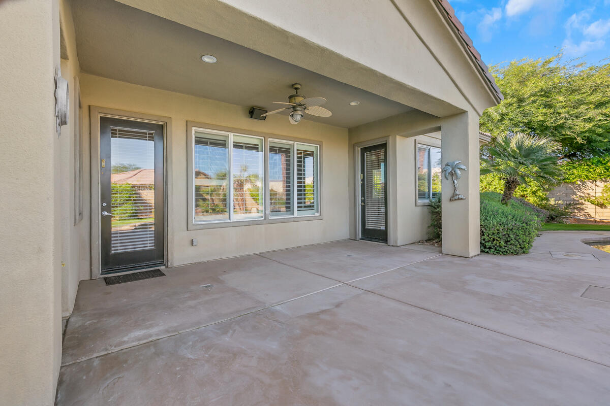112 Rosetta Court Palm Desert, CA 92211 - Photo 40 of 41 an empty room with windows and yard