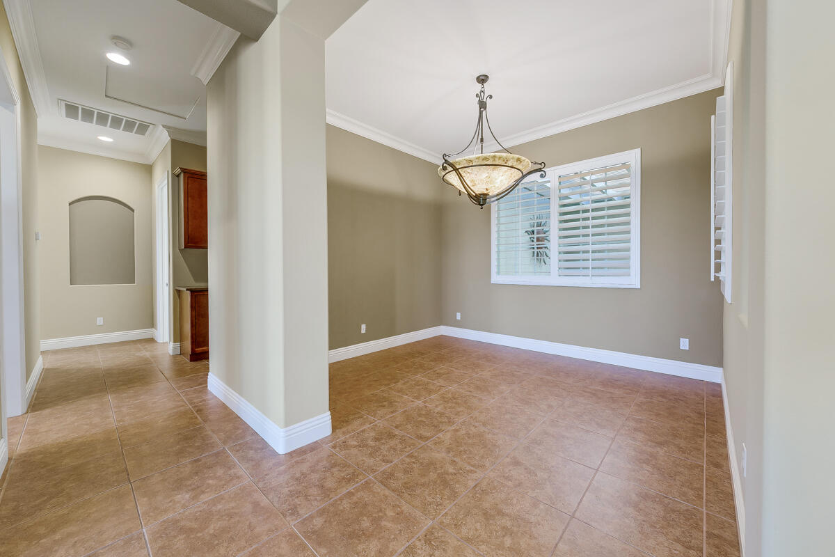 112 Rosetta Court Palm Desert, CA 92211 - Photo 7 of 41 a view of an empty room with a window
