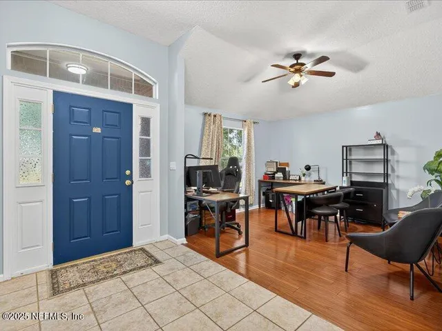 a view of a livingroom and dining room