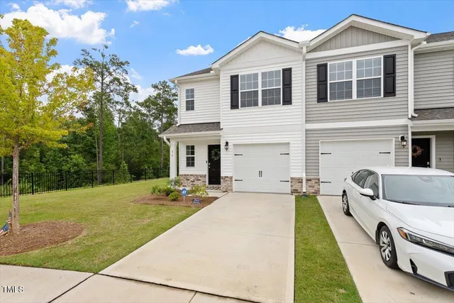 a front view of a house with entertaining space
