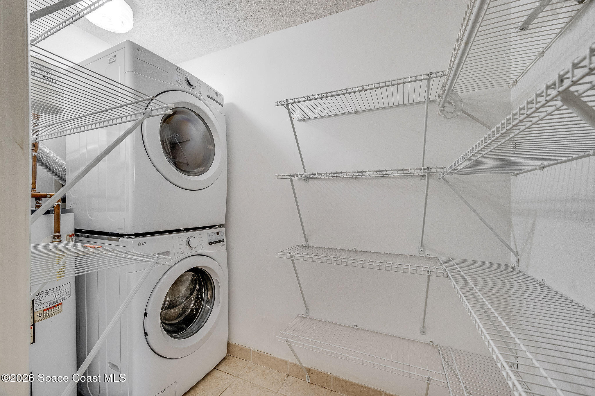 4304 London Town Road, Unit D224 Titusville, FL 32796 - Photo 20 of 32 a utility room with dryer and washer