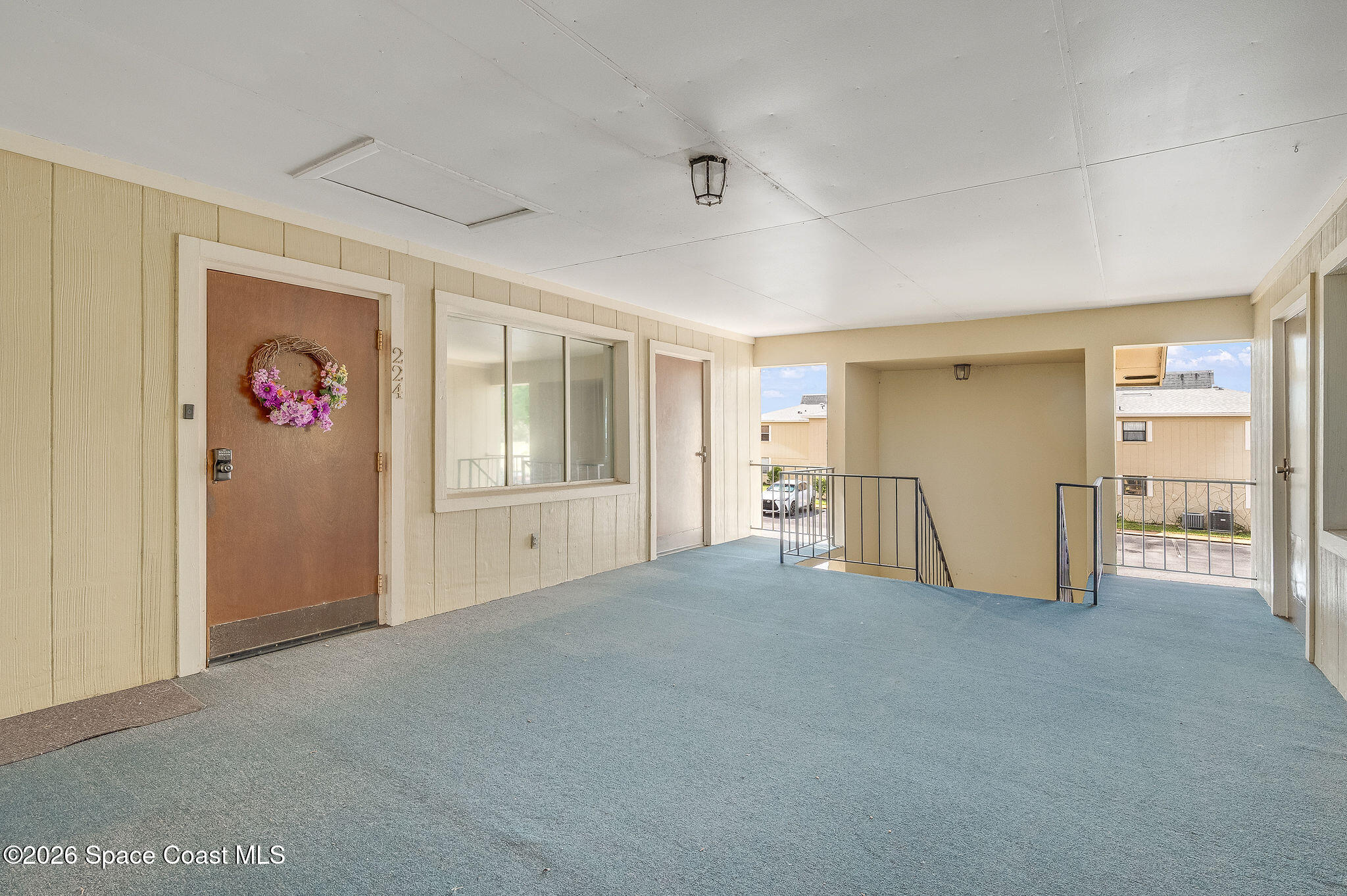 4304 London Town Road, Unit D224 Titusville, FL 32796 - Photo 2 of 32 a view of an empty room with a window