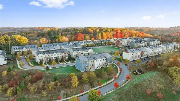 an aerial view of lake and residential houses