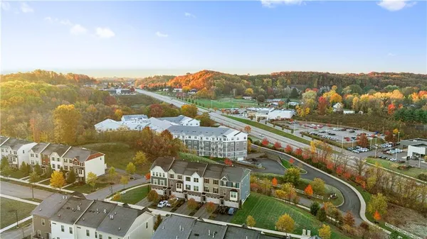 an aerial view of lake and city