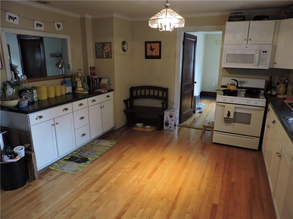 187 Rochester Street Westbrook, ME 04092 - Photo 9 of 28 1st Floor Apartment Kitchen and door...