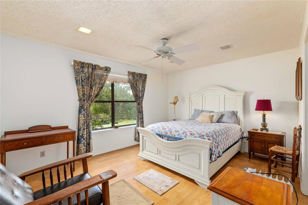 3718 Highway 36 Rising Star, TX 76471 - Photo 11 of 36 a bedroom with a bed and a window