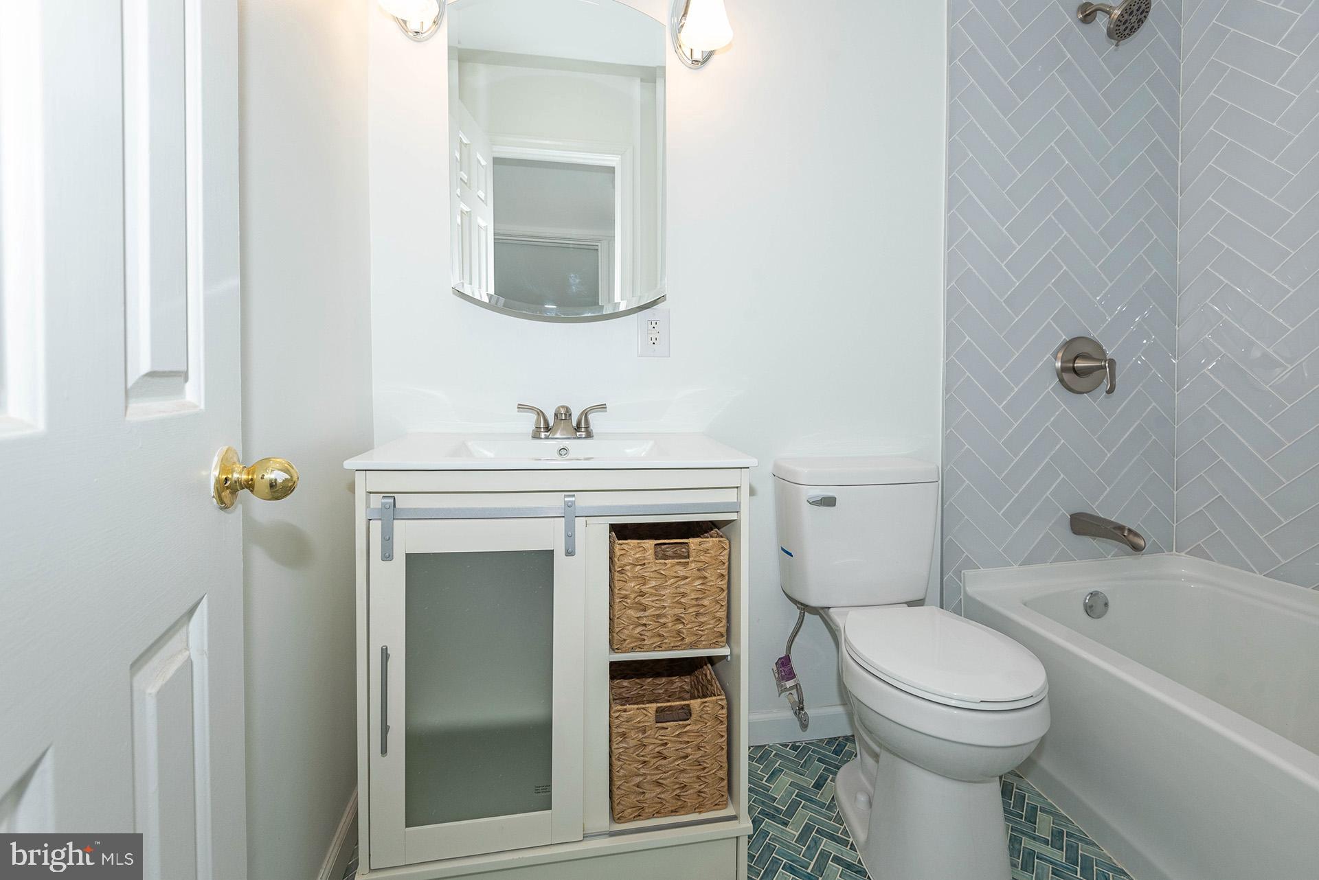 214 Upshur Street Northwest Washington, DC 20011 - Photo 20 of 50 1st floor full bathroom