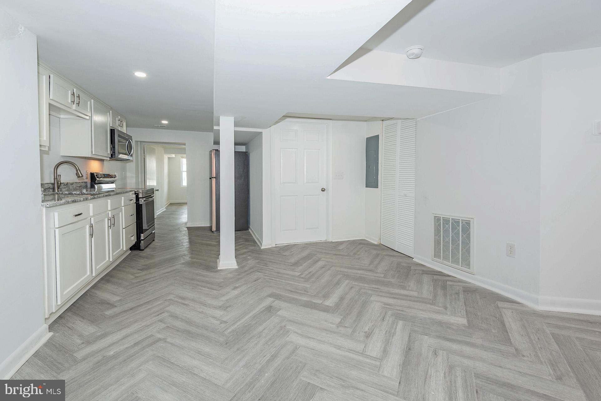 214 Upshur Street Northwest Washington, DC 20011 - Photo 37 of 50 Lower Level Eating Area