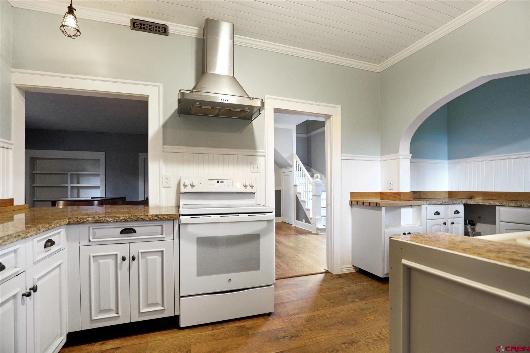 438 Bauer Avenue Mancos, CO 81328 - Photo 11 of 30 a kitchen with cabinets and appliances