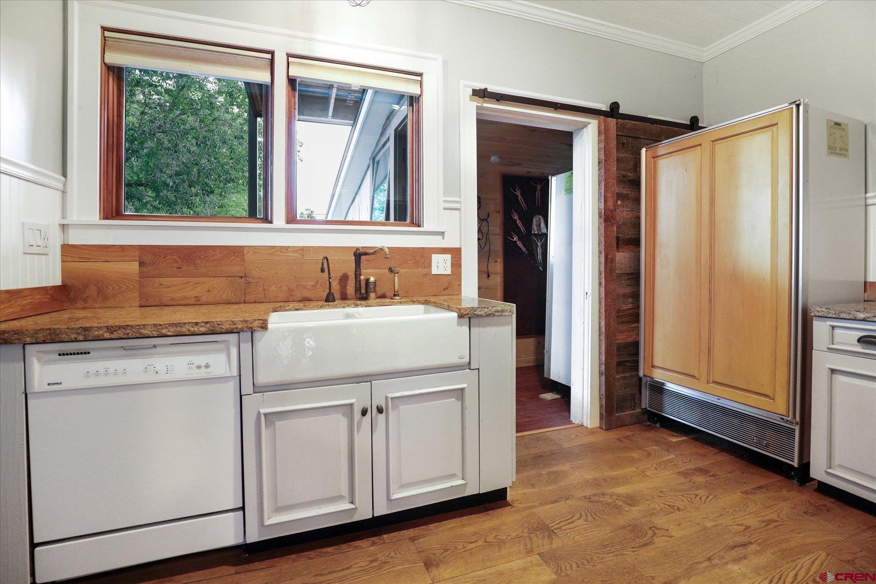 438 Bauer Avenue Mancos, CO 81328 - Photo 8 of 30 a utility room with washer and dryer