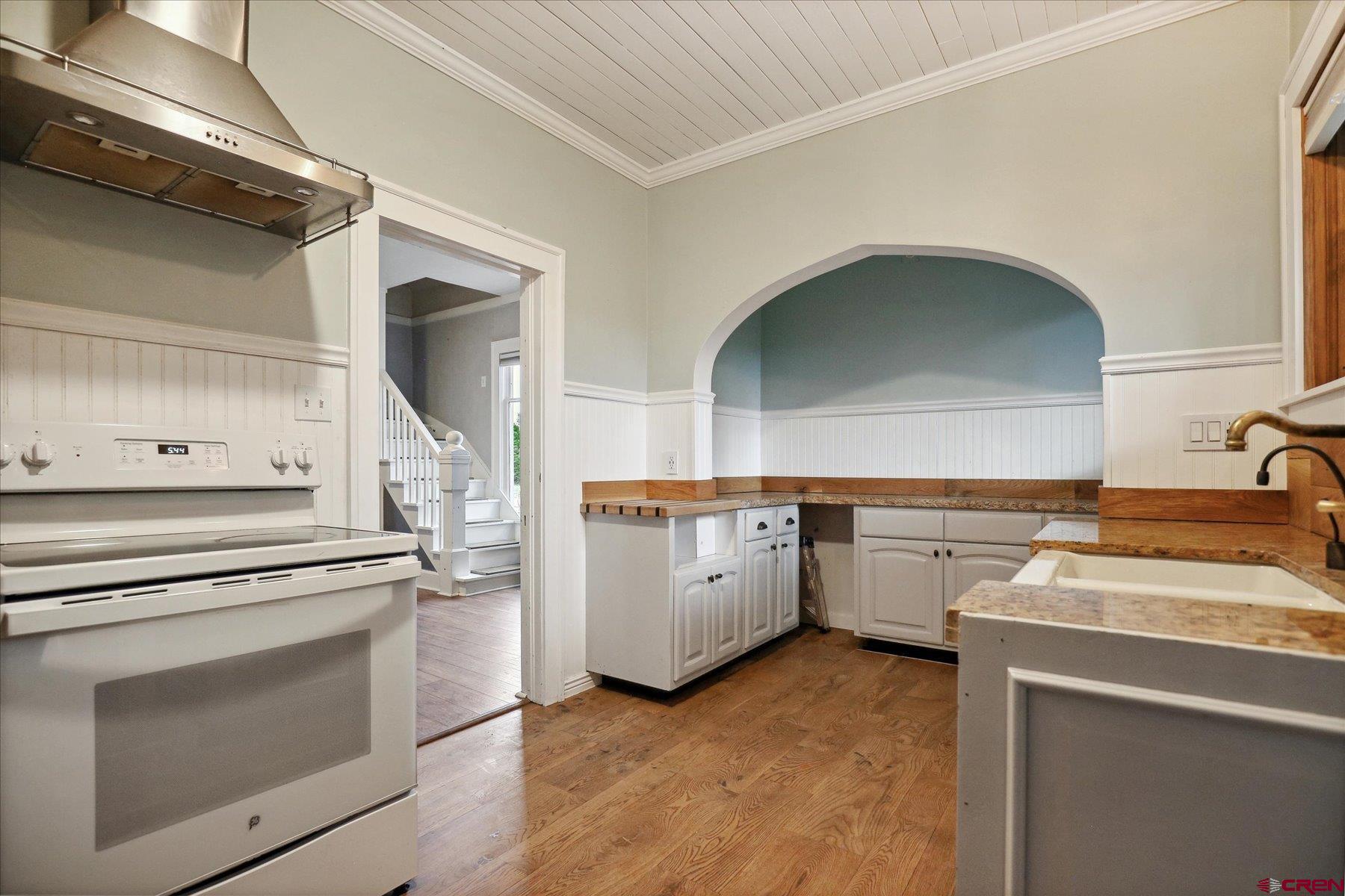 438 Bauer Avenue Mancos, CO 81328 - Photo 10 of 30 a kitchen with a stove and a sink