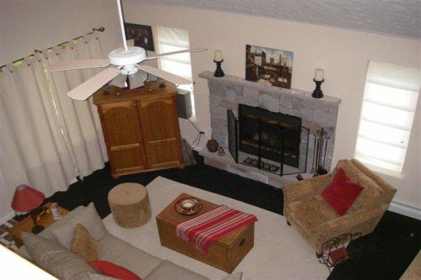 763 Sage Road Long Pond, PA 18334 - Photo 4 of 8 a living room with furniture and a fireplace