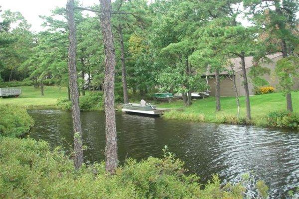 763 Sage Road Long Pond, PA 18334 - Photo 8 of 8 a view of lake background with house