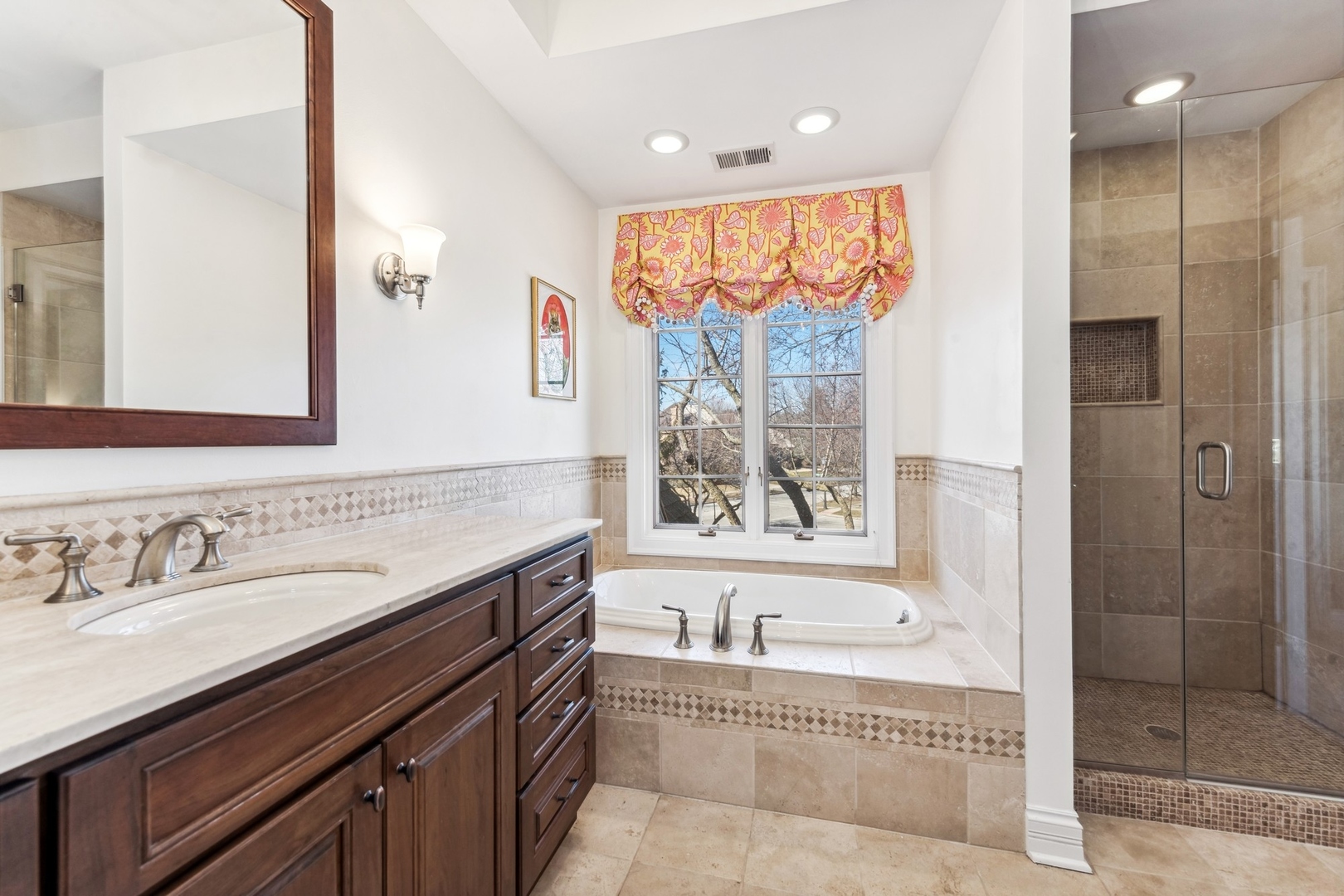 1334 Brandywine Road Libertyville, IL 60048 - Photo 15 of 32 a bathroom with a granite countertop tub sink shower and mirror