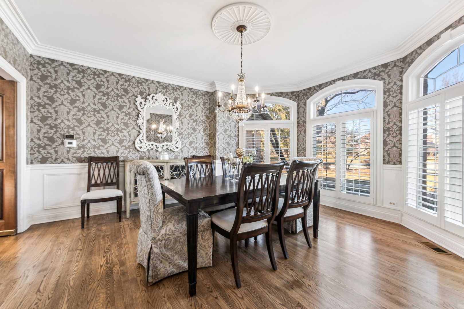 1334 Brandywine Road Libertyville, IL 60048 - Photo 5 of 32 a view of a dining room with furniture wooden floor and chandelier