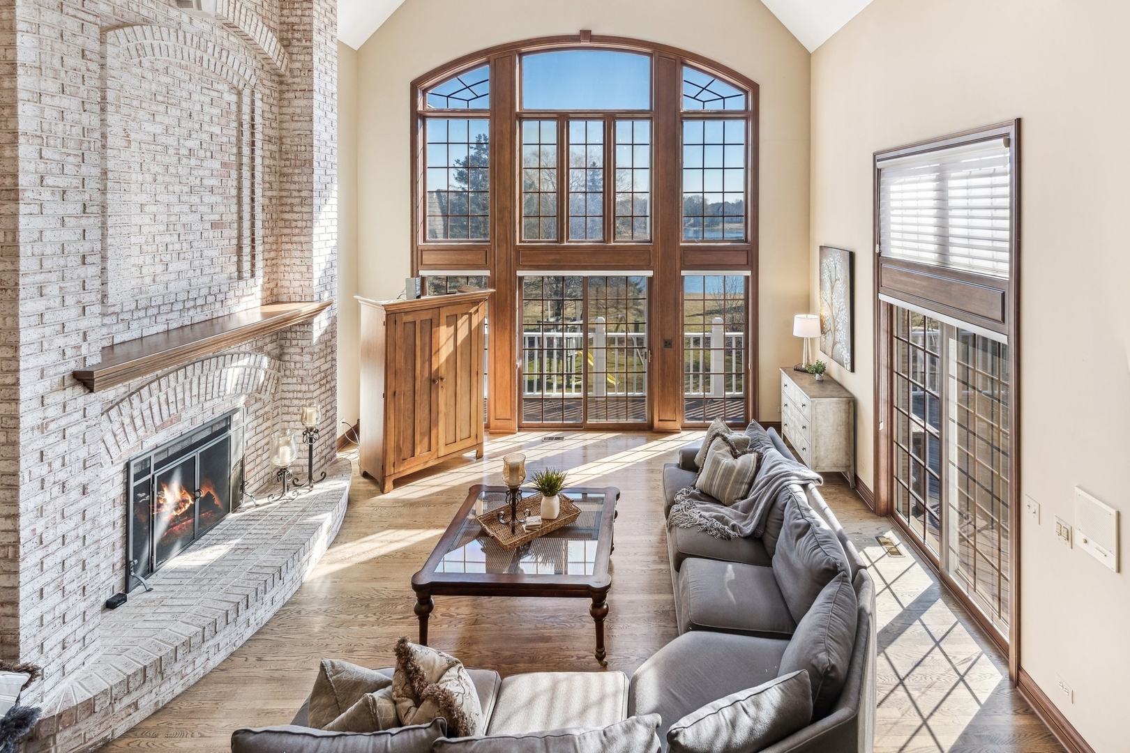 1334 Brandywine Road Libertyville, IL 60048 - Photo 7 of 32 a living room with furniture and a floor to ceiling window