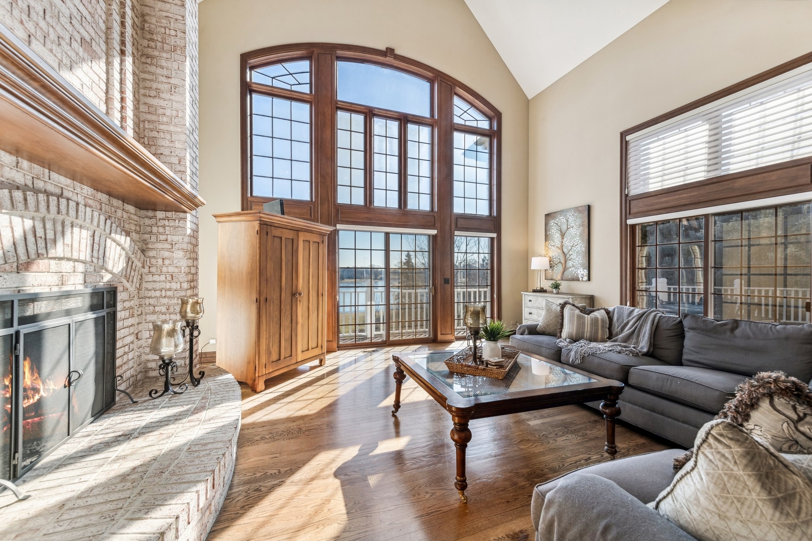 1334 Brandywine Road Libertyville, IL 60048 - Photo 8 of 32 a living room with furniture and a floor to ceiling window