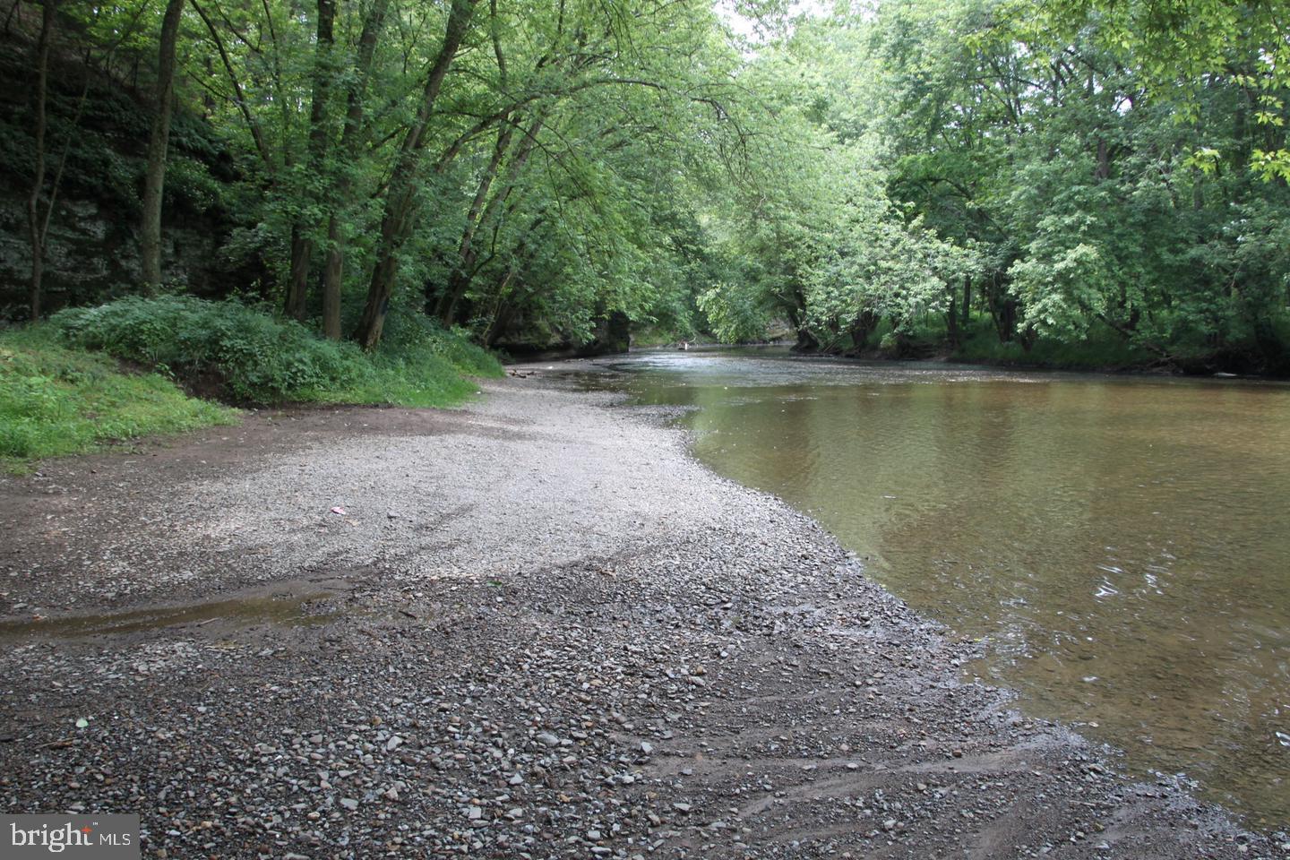 Slabtown Road Hancock, MD 21750 - Photo 1 of 20 a view of a lake with a forest