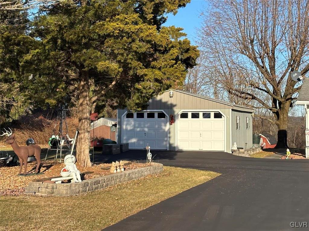 1494 Teels Road Pen Argyl, PA 18072 - Photo 2 of 12 a view of a house with snow on the road
