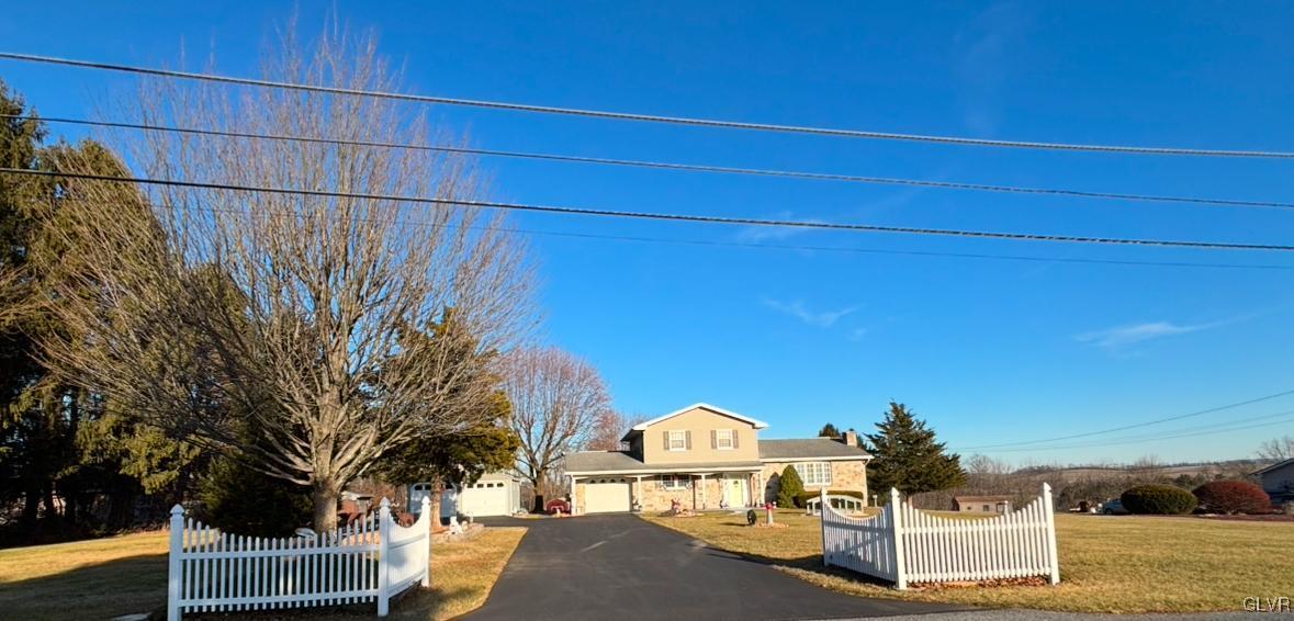 1494 Teels Road Pen Argyl, PA 18072 - Photo 3 of 12 a view of front of house with a yard
