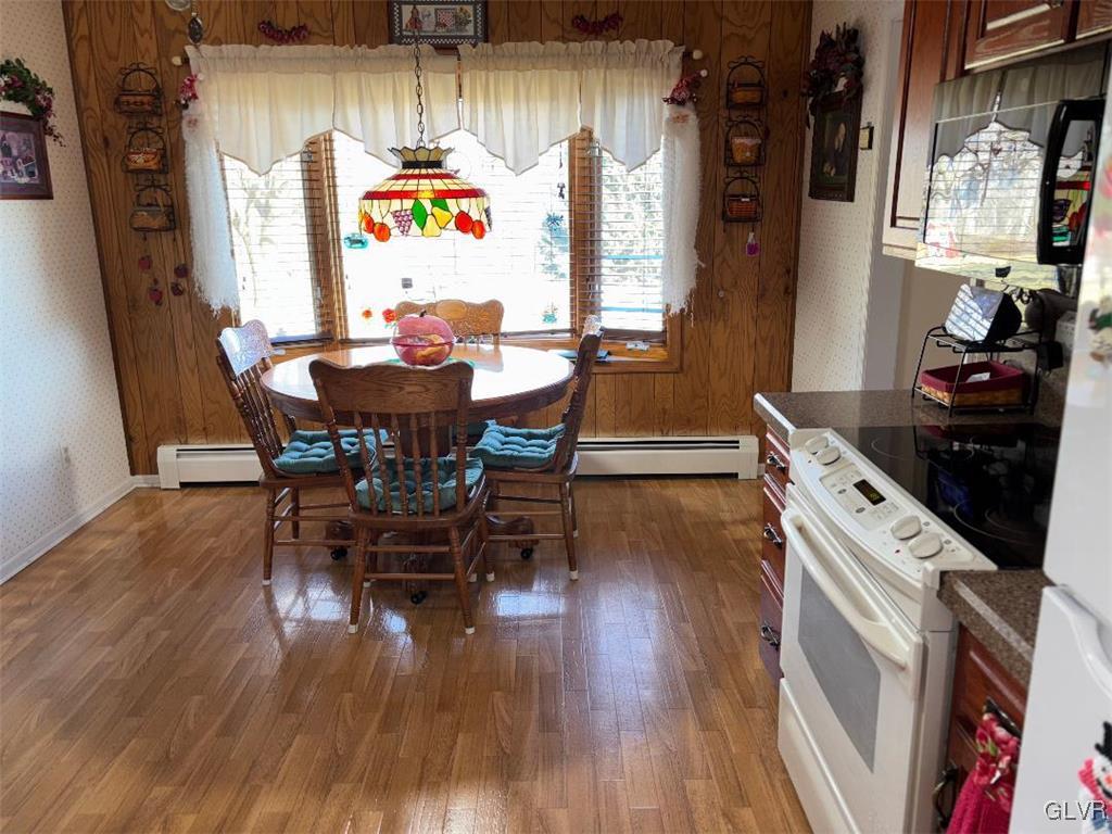 1494 Teels Road Pen Argyl, PA 18072 - Photo 7 of 12 a view of a dining room with furniture window and wooden floor