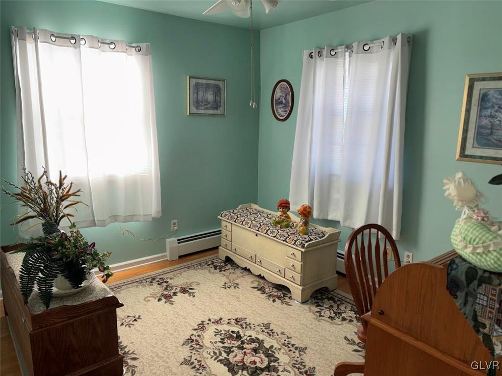 1494 Teels Road Pen Argyl, PA 18072 - Photo 9 of 12 a living room with furniture and a window