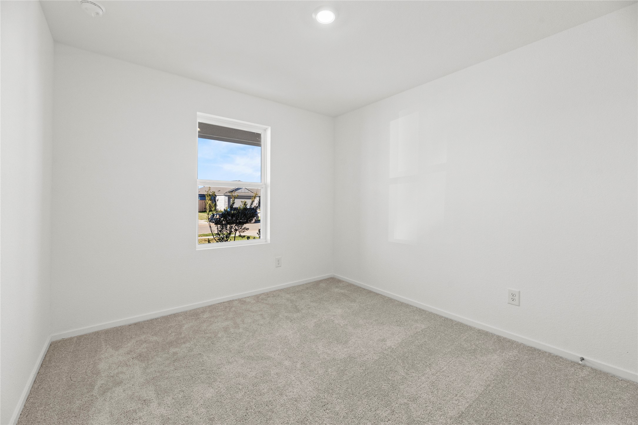 16222 Rustic Prairie Drive Hockley, TX 77447 - Photo 5 of 16 an empty room with a window