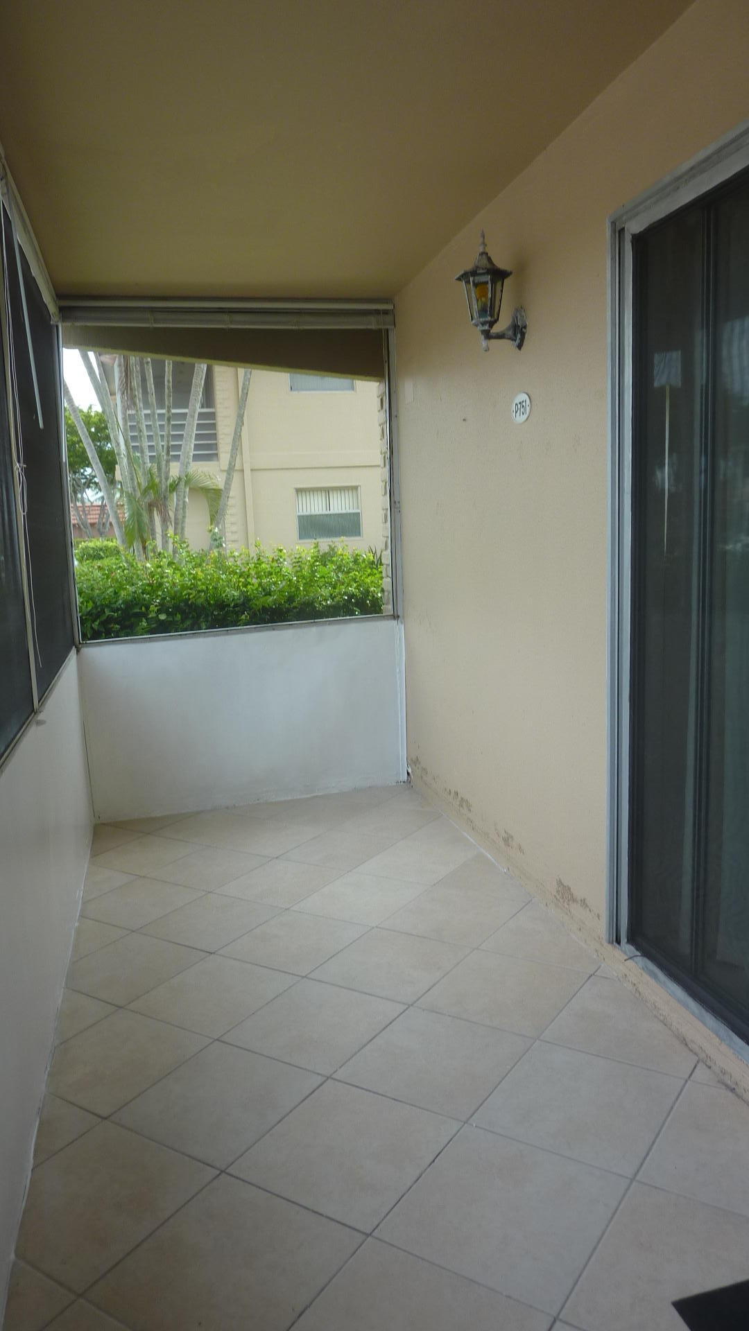 751 Monaco P, Unit 751 Delray Beach, FL 33446 - Photo 22 of 28 Screened FL room