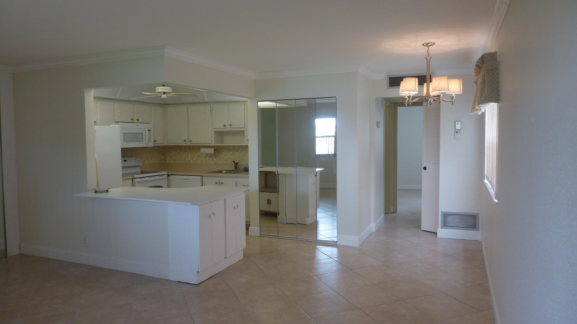 751 Monaco P, Unit 751 Delray Beach, FL 33446 - Photo 7 of 28 Open kitchen, living, dining area