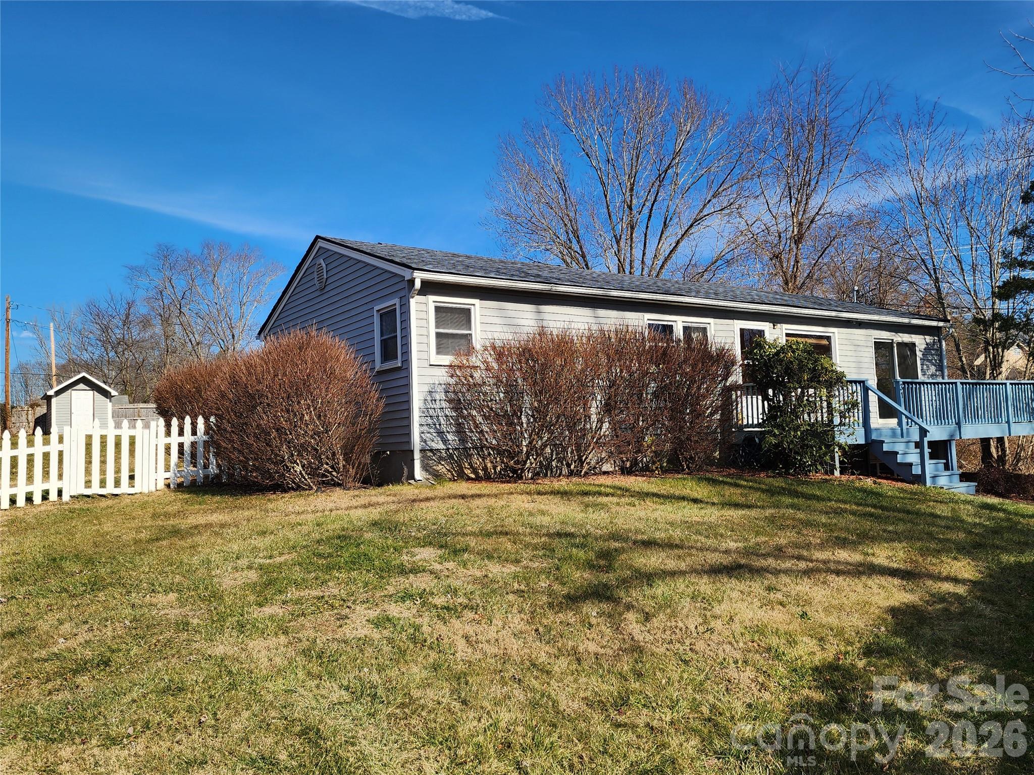 31 Stanley Street Candler, NC 28715 - Photo 1 of 22 a big room with an outdoor space and seating area