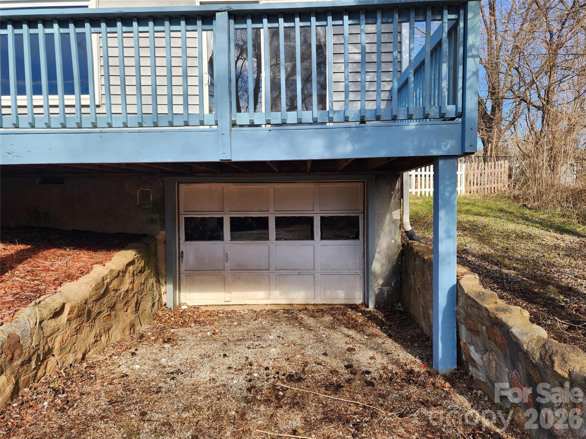 31 Stanley Street Candler, NC 28715 - Photo 18 of 22 a view of wooden door and outdoor space