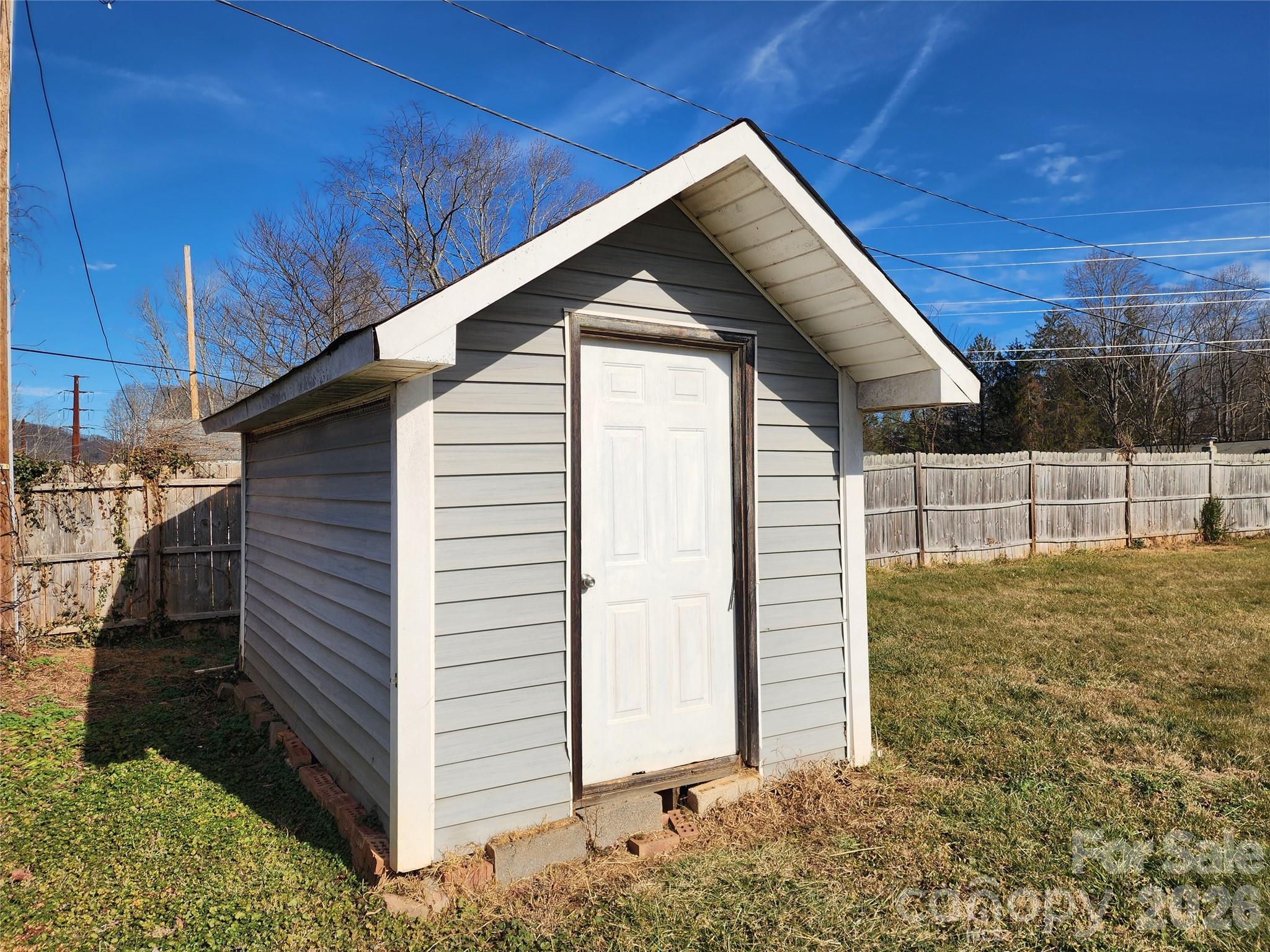 31 Stanley Street Candler, NC 28715 - Photo 19 of 22 a view of a house with a yard