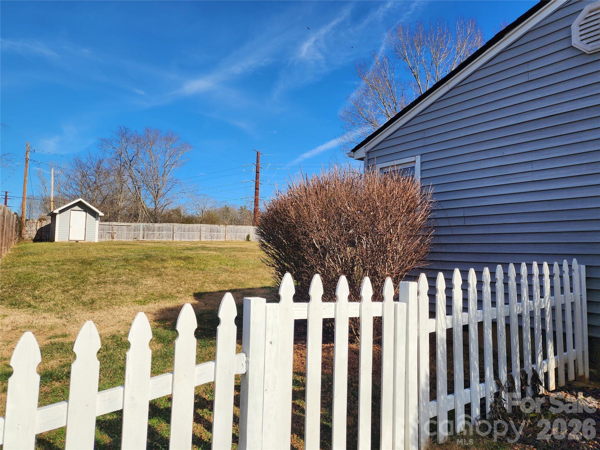31 Stanley Street Candler, NC 28715 - Photo 21 of 22 a view of a house with wooden fence