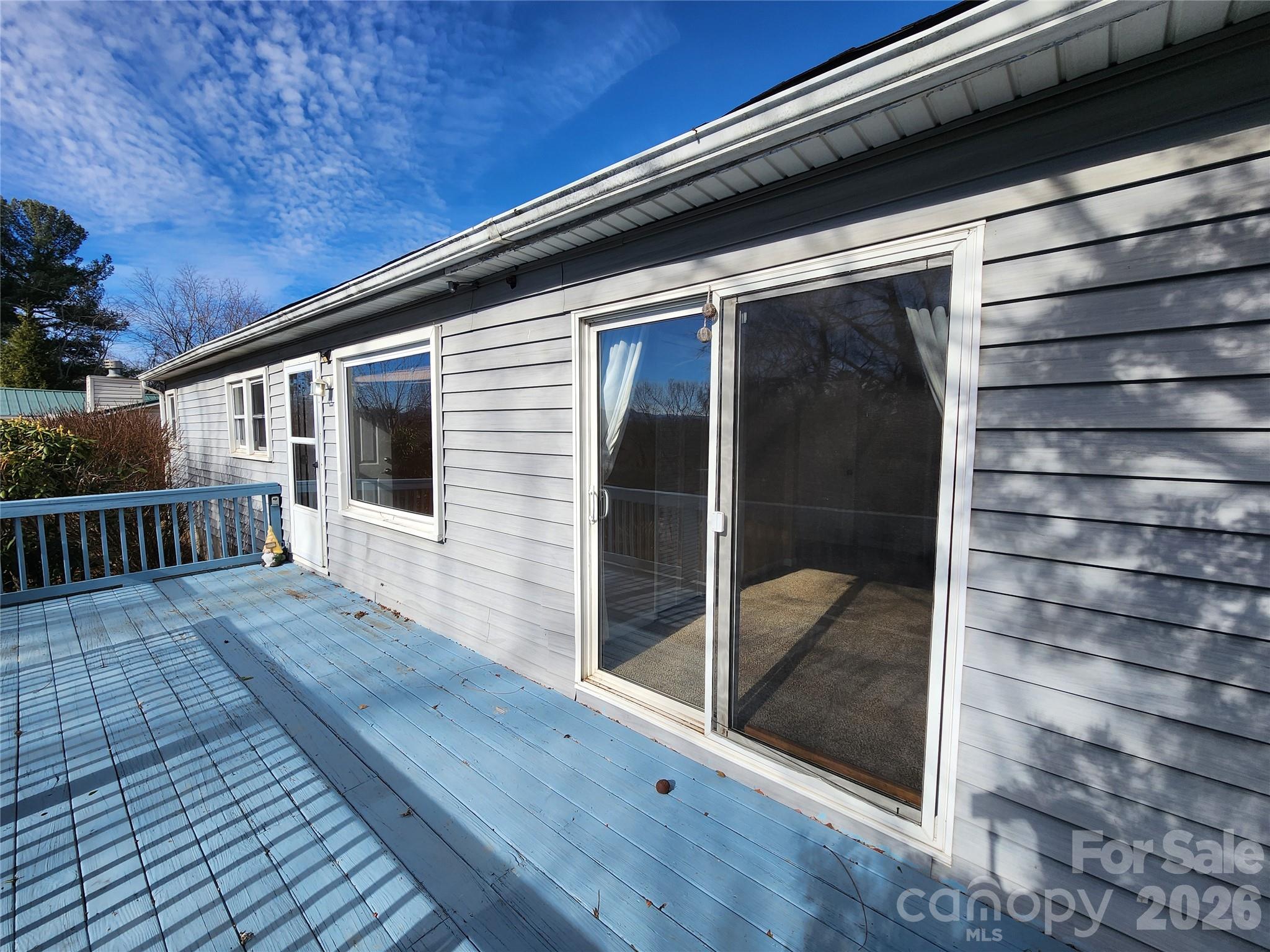 31 Stanley Street Candler, NC 28715 - Photo 4 of 22 a view of backyard with small cabin