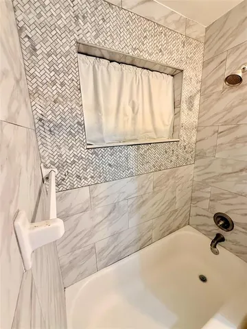 a bathroom with a bathtub
