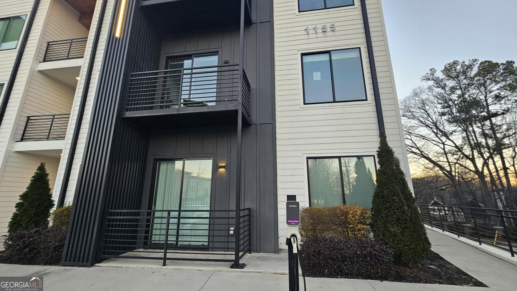 1155 Custer Avenue Southeast, Unit 101 Atlanta, GA 30316 - Photo 4 of 27 a view of a house with a door and a window