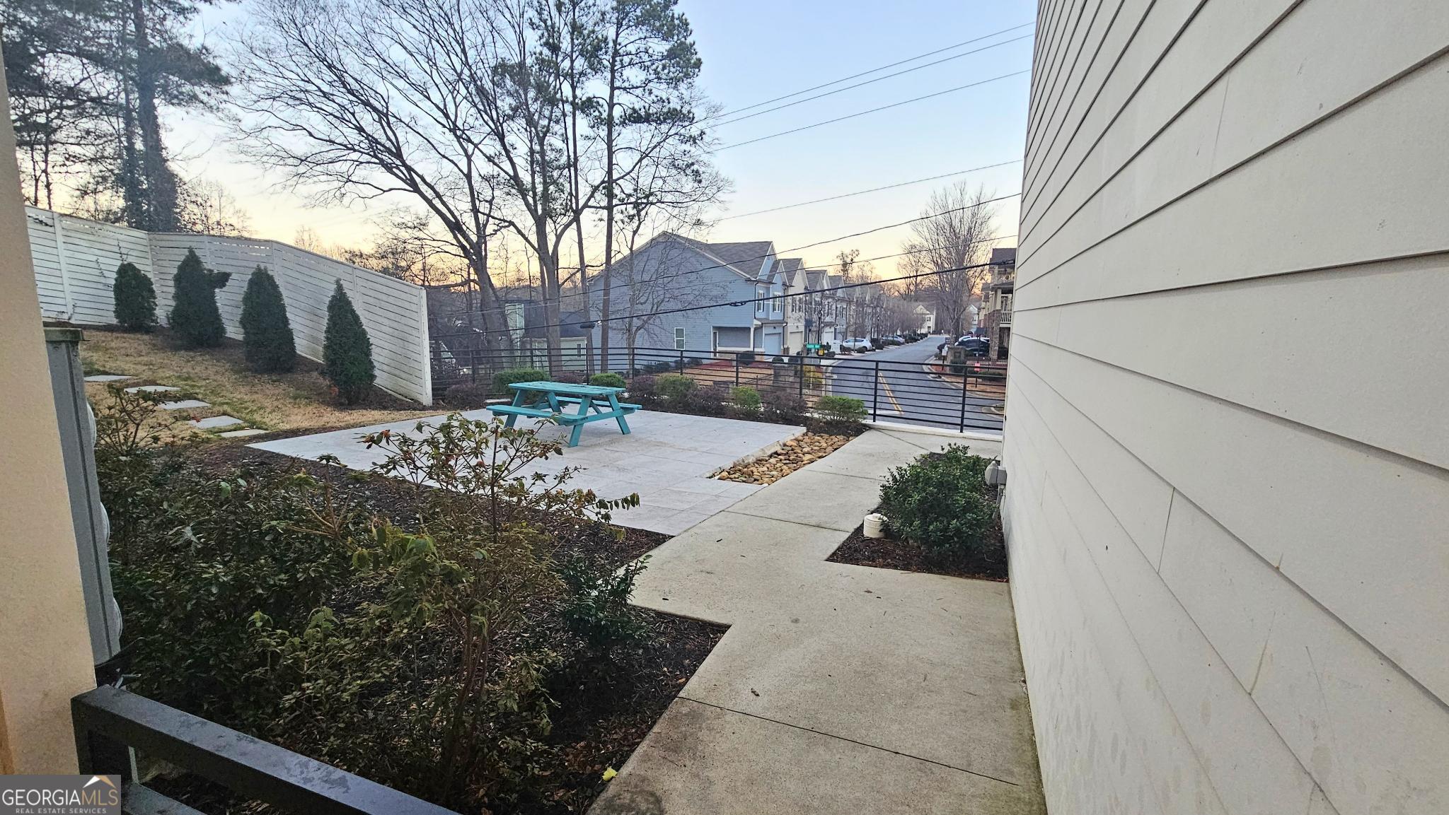 1155 Custer Avenue Southeast, Unit 101 Atlanta, GA 30316 - Photo 6 of 27 a view of a backyard with large trees