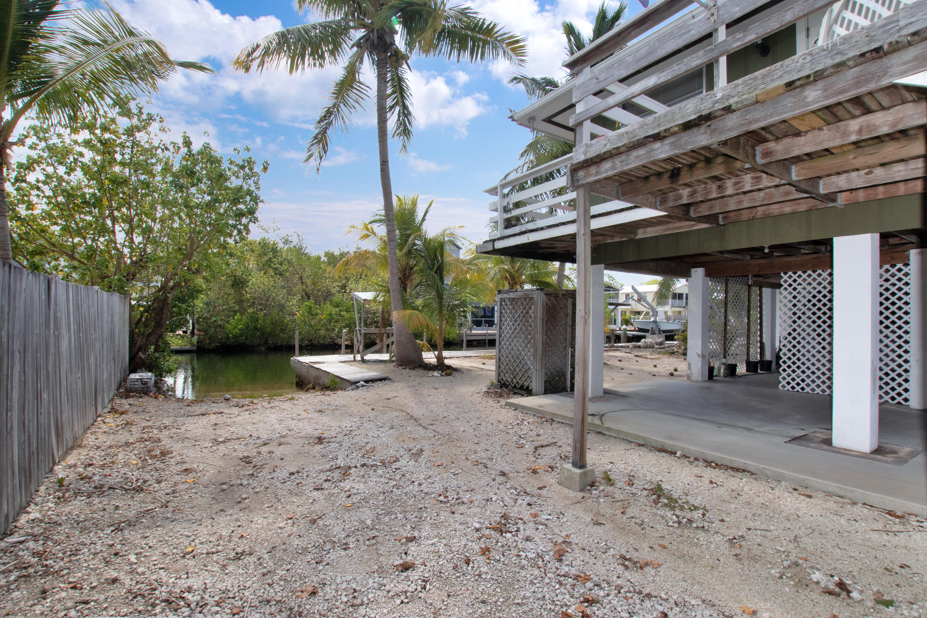 661 Pirates Road Summerland Key, FL 33042 - Photo 30 of 45 Side yard, boat ramp