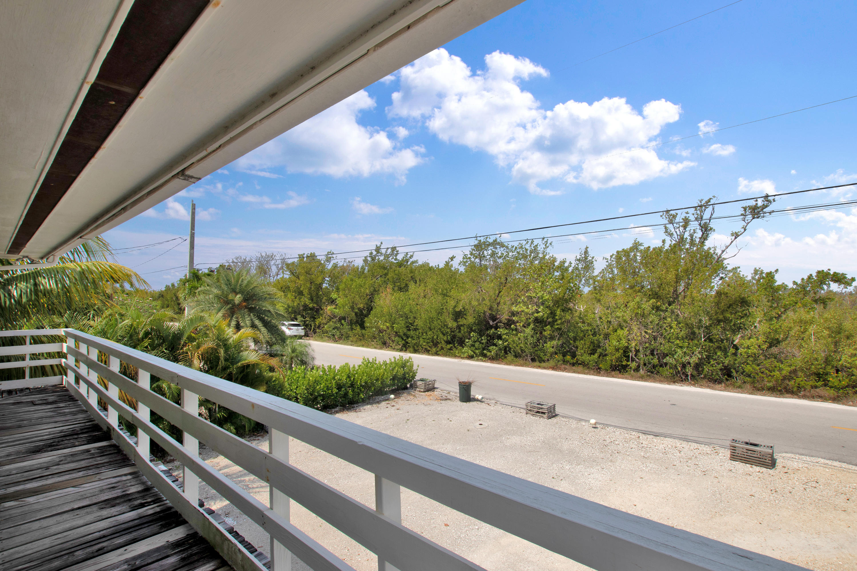 661 Pirates Road Summerland Key, FL 33042 - Photo 9 of 45 Front wrap around porch
